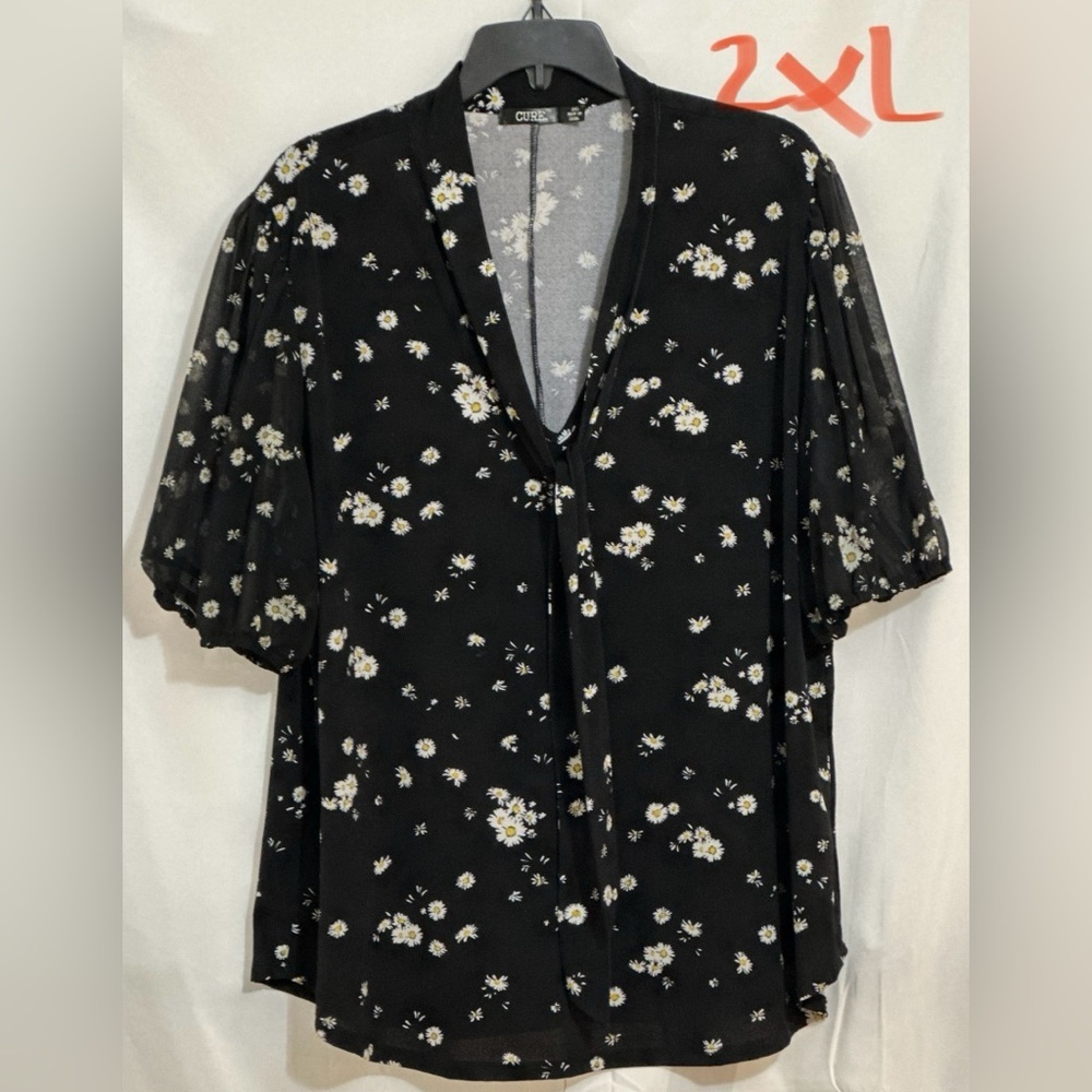 LADIES BLACK TOP WITH WHITE FLOWERS